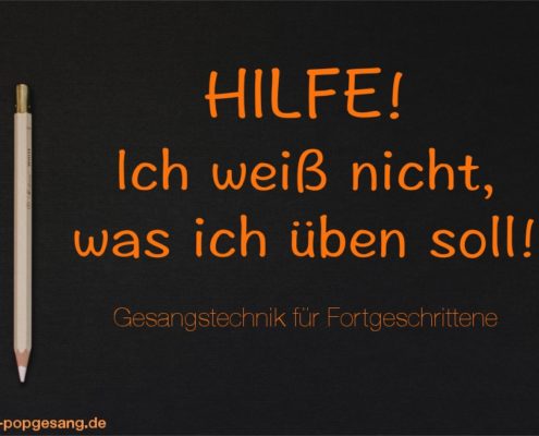 Gesangstechnik üben für Fortgeschrittene Sänger Das Foto zeigt einen Stift auf schwarzem Hintergrund, dazu die Artikelüberschrift "Hilfe! Ich weiß nicht, was ich üben soll!"
