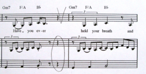 Noten für Gesangsstimme und Klavier mit dem Text "Have you ever held your breath and".